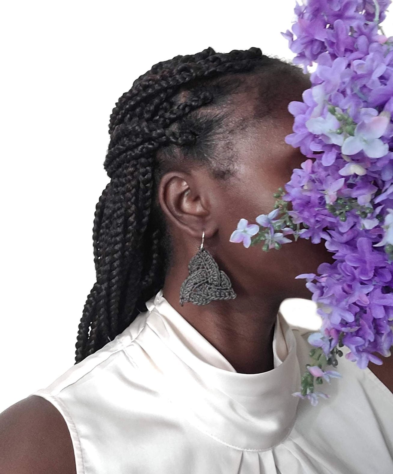 Model wearing Celtic Knot Trinity Earrings.