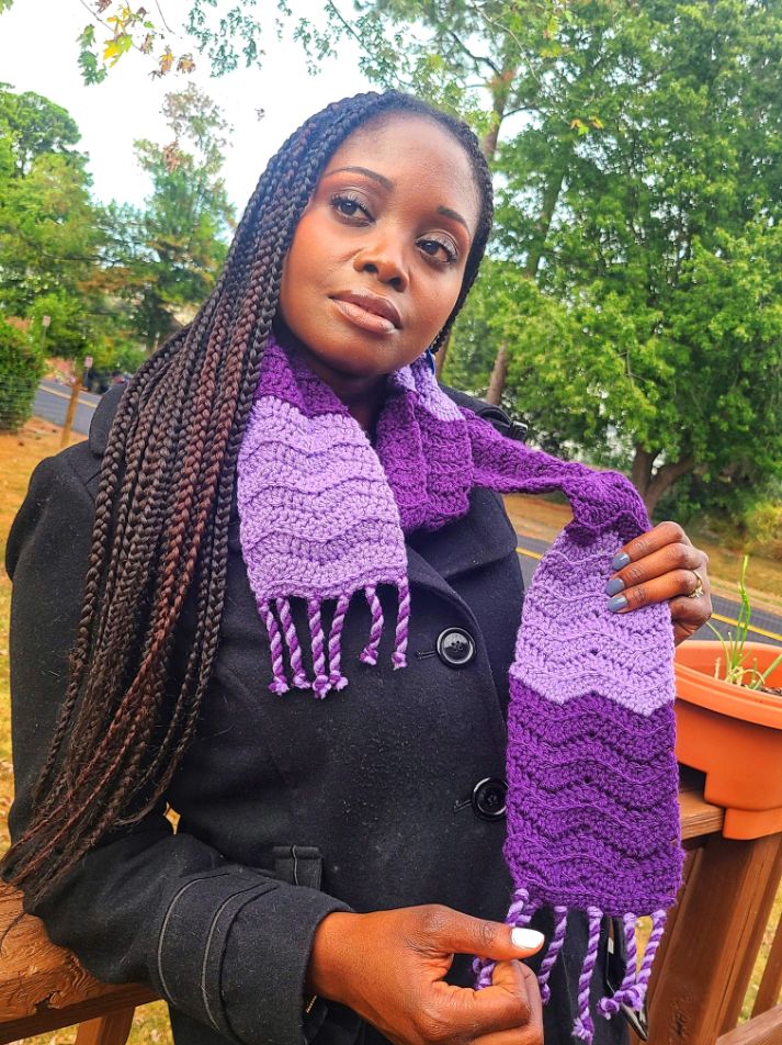 Model wearing two tone purple scarf