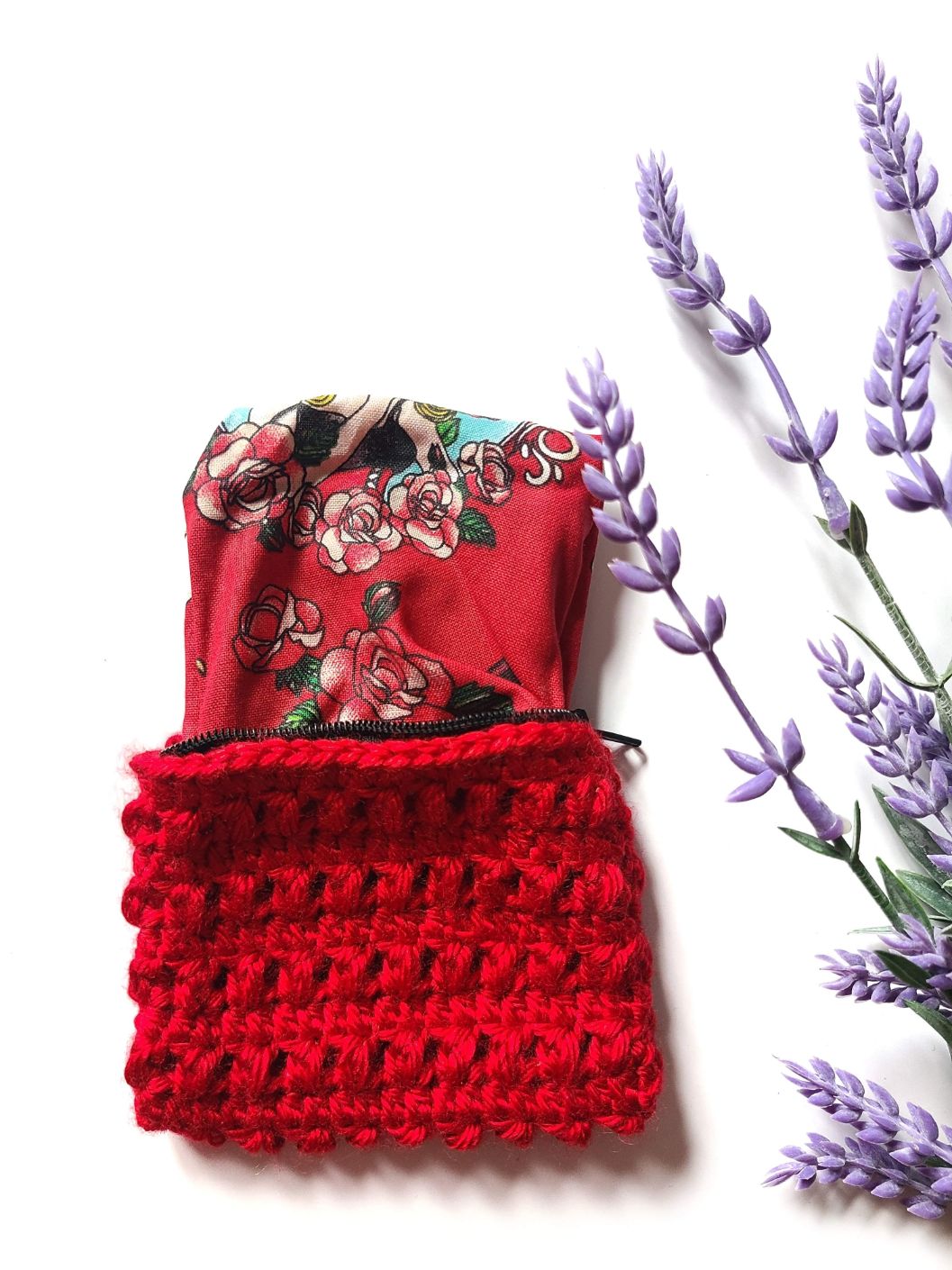 Red change purse lined with fierce woman and red roses