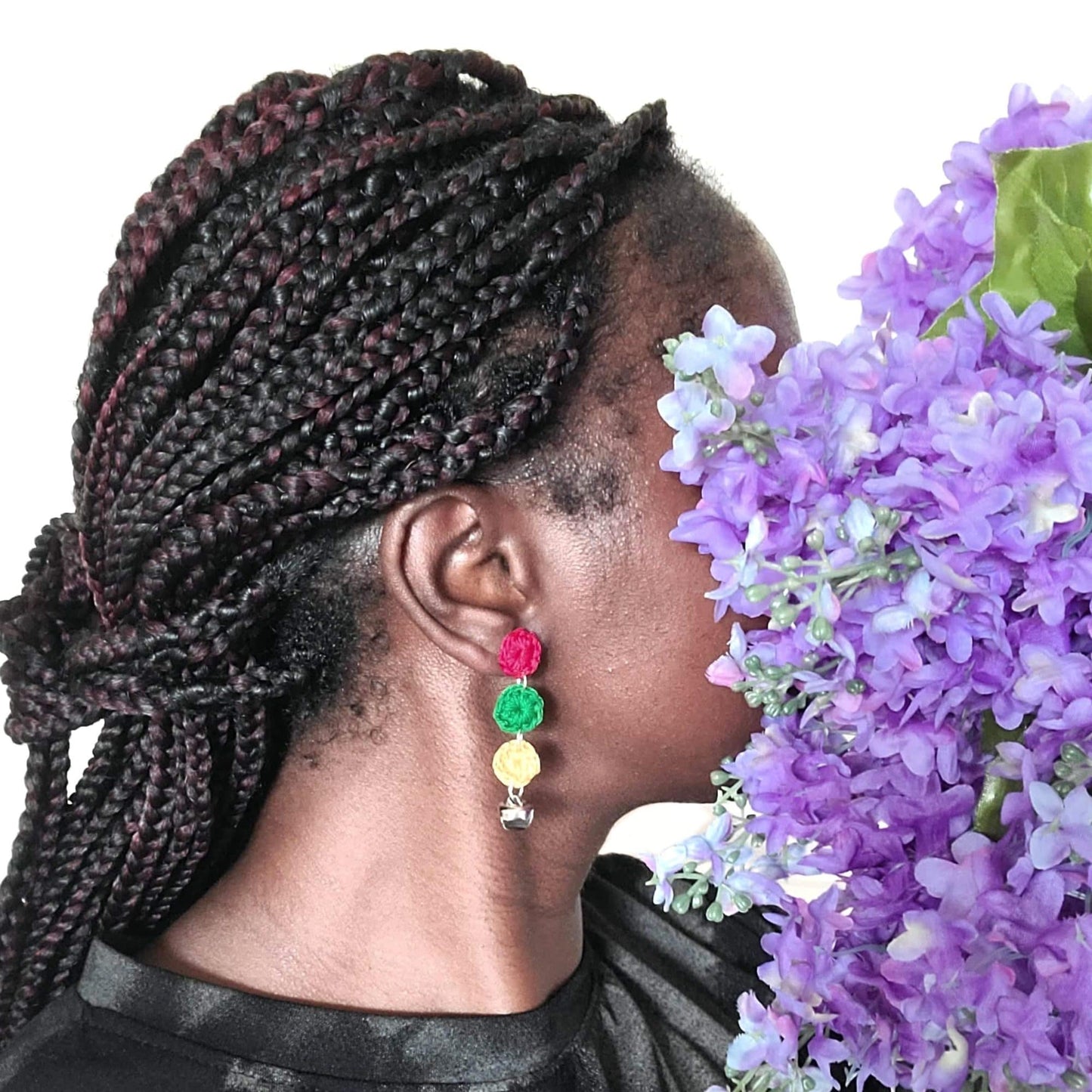 Bell Earrings dangling in colors red, green, and gold with gold bell on end.