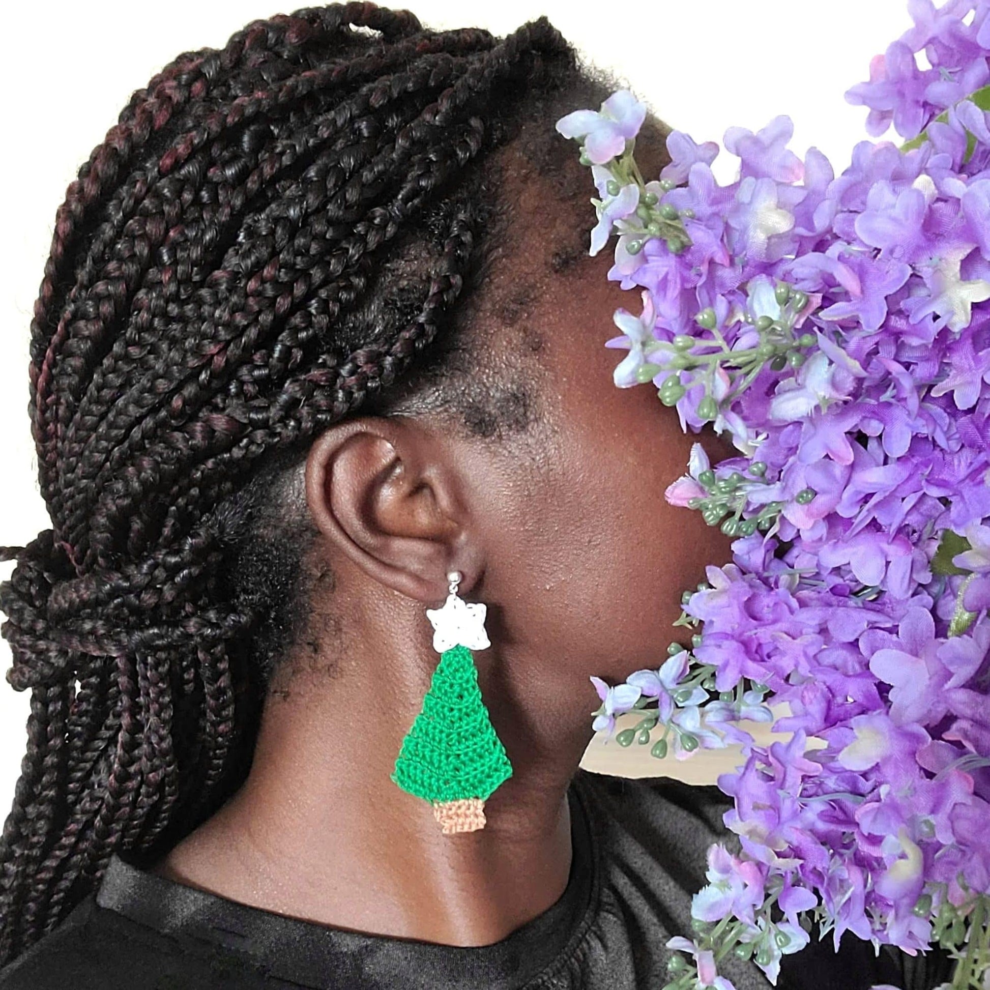 Christmas Tree Earrings on model.