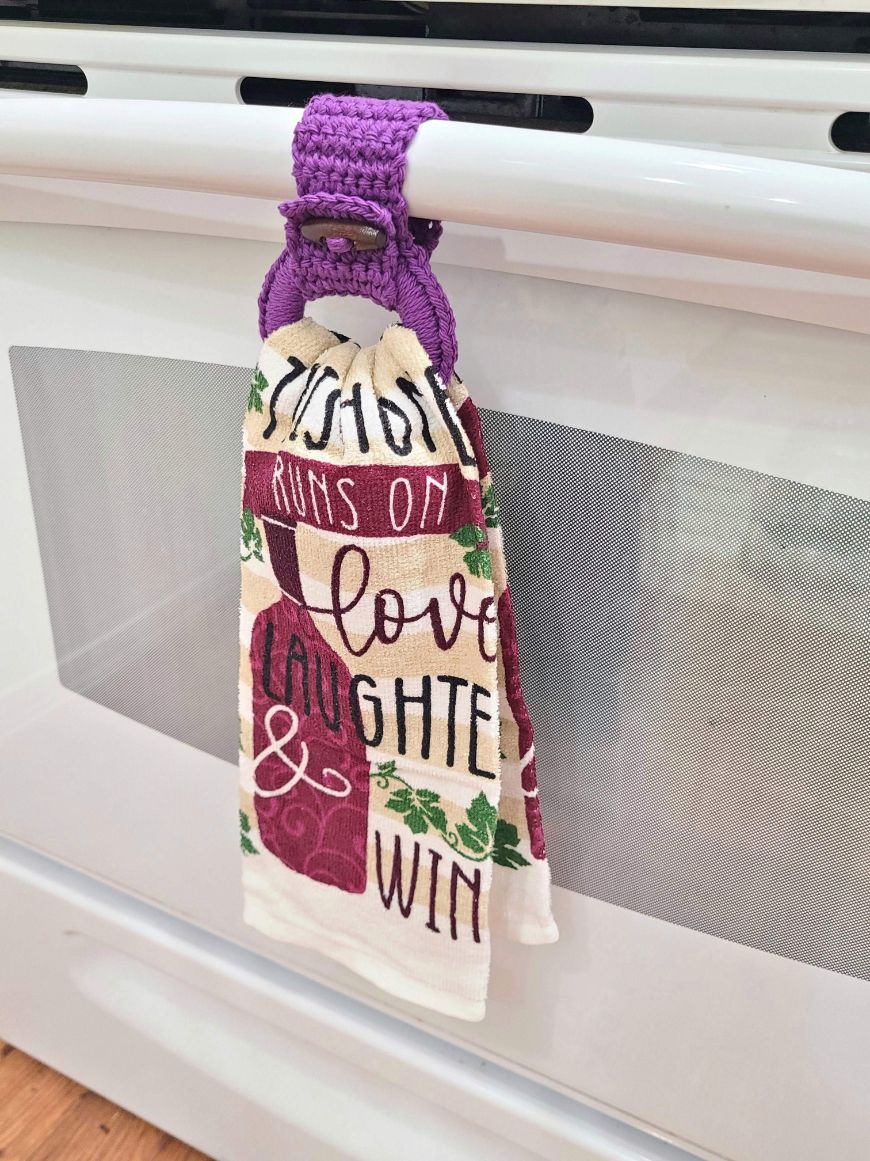 Model of purple kitchen towel holder