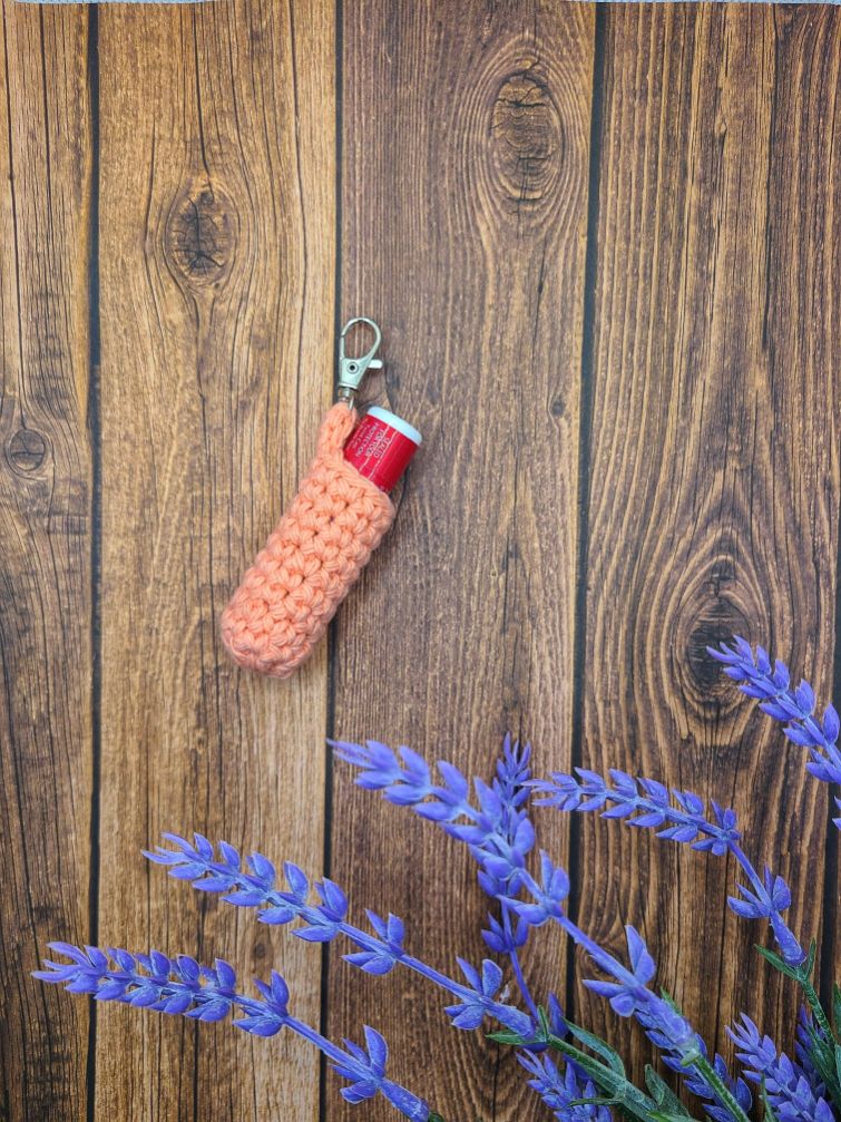 Coral chap stick holder with clasp
