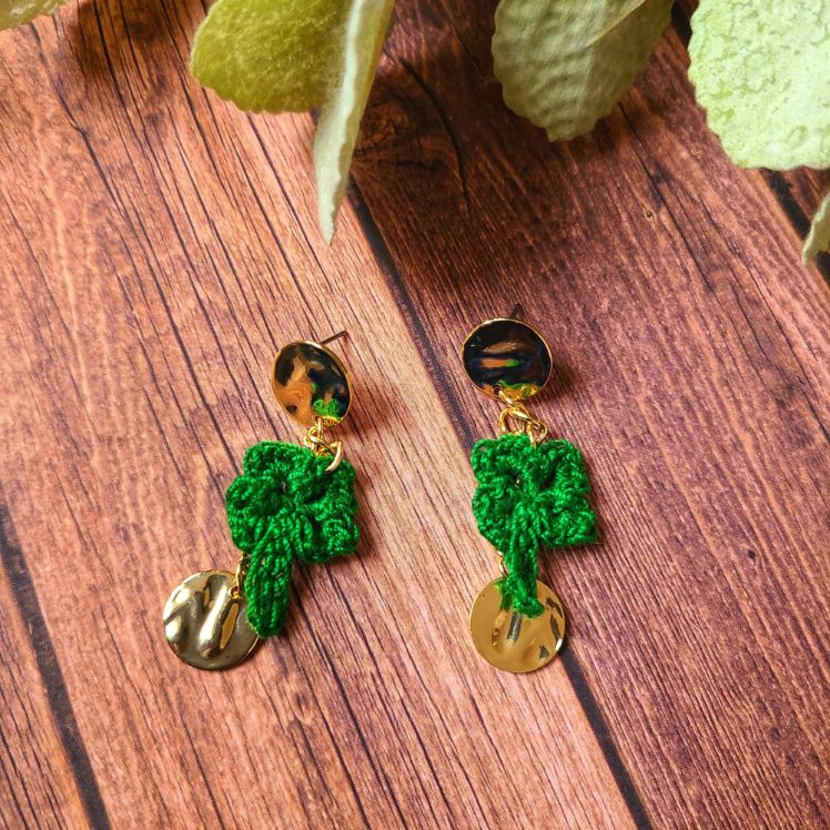 Dangle shamrock earrings.