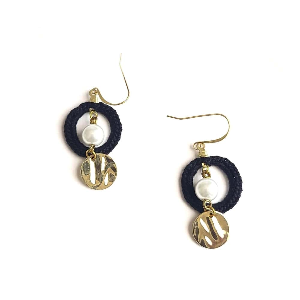 Pearl dangle drop earrings with gold and black.