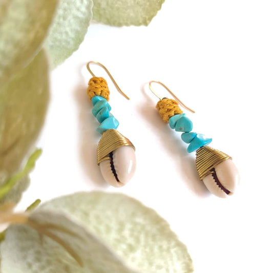 Wagnerite Turquoise earrings that dangle with a cowrie shell
